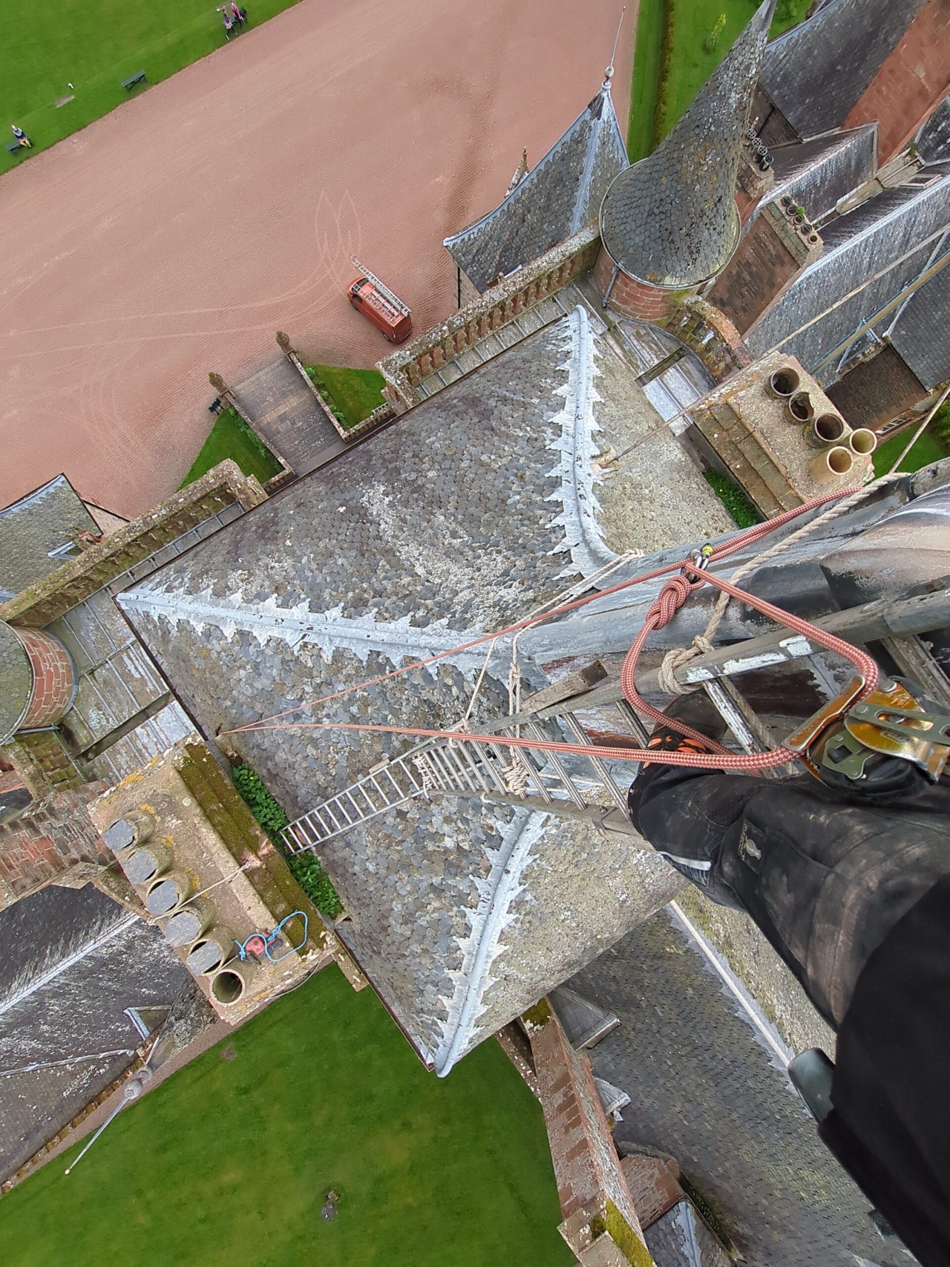 Maintenance on a castle roof