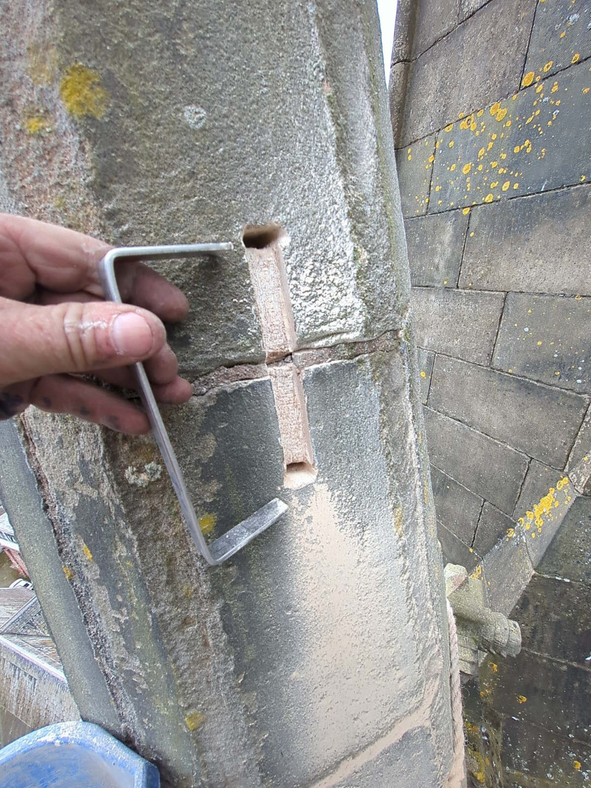 Stainless steel cramps installed to church spire pinnacles